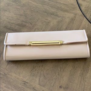 Aldo nude and gold clutch